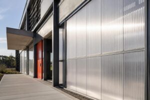 How Do Transparent and Decorative Building Materials Improve Modern Facade Design?